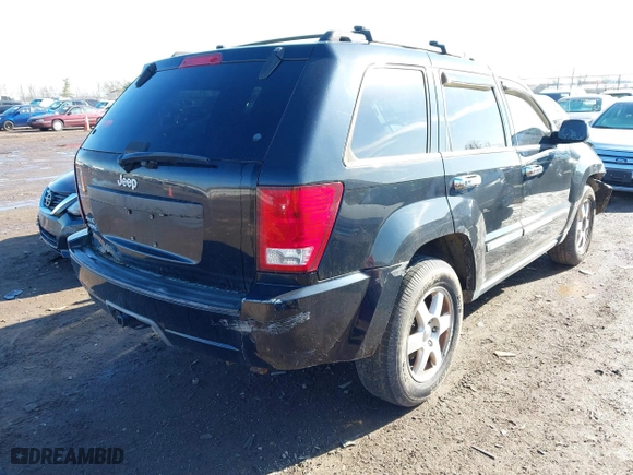 2008 Jeep Grand Cherokee Laredo with VIN 1J8GR48K98C193110, listed as a IAAI auction lot 41833331 with 174,518 mi miles. Bid and sale history available at carsss.com. Image 4.