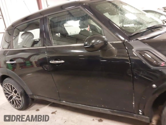 2012 MINI Countryman with VIN WMWZB3C53CWM05133, listed as a IAAI auction lot 41493309 with 114,412 mi miles and . Bid and sale history available at DreamBid. Image 14.