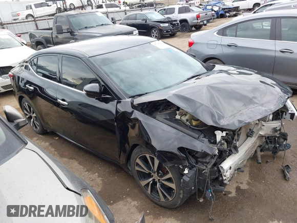 2018 Nissan Maxima S with VIN 1N4AA6AP7JC385580, listed as a IAAI auction lot 41748213 with 96,240 mi miles and . Bid and sale history available at DreamBid. Image 14.