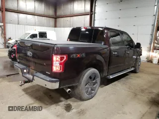 2020 Ford F-150 XL with VIN 1FTEW1EP2LKF10584, listed as a Copart auction lot 60520615 with 64,150 mi miles and Salvage title. Bid and sale history available at DreamBid. Image 3.