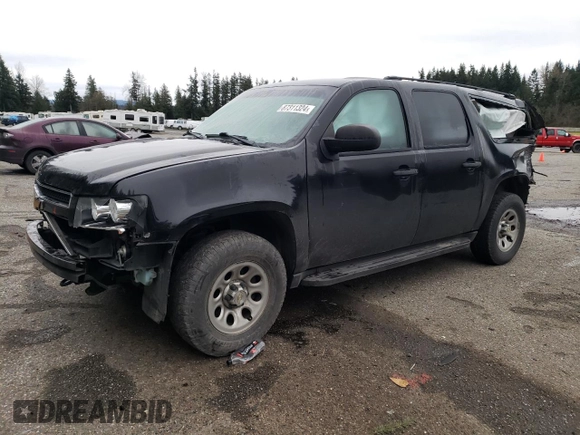 2010 Chevrolet Suburban LS z VIN 1GNUKHE3XAR192464, wystawiony jako Copart lot #87311324 z przebiegiem Nie podano mil oraz Szkoda całkowita • Salvage title. Historia ofert i sprzedaży dostępna na DreamBid. Obrazek 1.