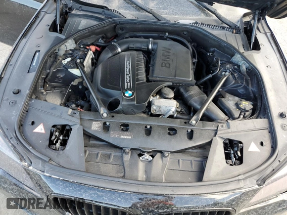 2015 BMW 7 Series 740Li with VIN WBAYE4C58FD138919, listed as a Copart auction lot 69409074 with 145,549 mi miles and Salvage Title. Bid and sale history available at DreamBid. Image 11.