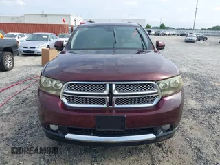 2012 Dodge Durango Crew z VIN 1C4RDHDG1CC144421, wystawiony jako IAAI lot #42232137 z przebiegiem 215 051 mil mil oraz . Historia ofert i sprzedaży dostępna na DreamBid. Obrazek 12.