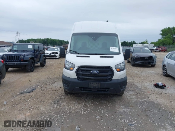 2020 Ford Transit Cargo with VIN 1FTBR3X83LKB51984, listed as a IAAI auction lot 42567147 with 209,178 mi miles and . Bid and sale history available at DreamBid. Image 12.