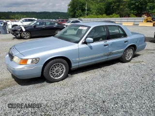2002 Mercury Grand Marquis GS z VIN 2MEFM74W62X640335, wystawiony jako Copart lot #57065615 z przebiegiem 133 385 mil mil oraz Szkoda całkowita • Salvage title. Historia ofert i sprzedaży dostępna na DreamBid. Obrazek 1.