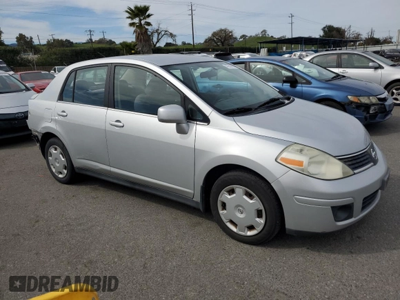 2009 Nissan Versa 1.8 S with VIN 3N1BC11E69L374261, listed as a Copart auction lot 47252795 with 70,600 mi miles and Salvage Title. Bid and sale history available at carsss.com. Image 4.
