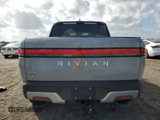 2023 Rivian R1T Adventure with VIN 7FCTGBAA2PN028983, listed as a Copart auction lot 45307015 with 220 mi miles and Salvage Title. Bid and sale history available at DreamBid. Image 6.
