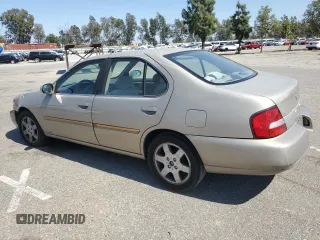 2000 Nissan Altima XE z VIN 1N4DL01D5YC243801, wystawiony jako Copart lot #52642985 z przebiegiem 237 665 mil mil oraz Szkoda całkowita • Salvage title. Historia ofert i sprzedaży dostępna na DreamBid. Obrazek 2.