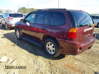2007 GMC Envoy SLE with VIN 1GKDS13S472201367, listed as a IAAI auction lot 41327646 with 232,019 mi miles. Bid and sale history available at carsss.com. Image 3.