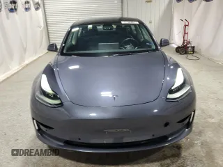 2022 Tesla Model 3 with VIN 5YJ3E1EA8NF287506, listed as a Copart auction lot 55674145 with 106,745 mi miles and Clean Title. Bid and sale history available at DreamBid. Image 5.