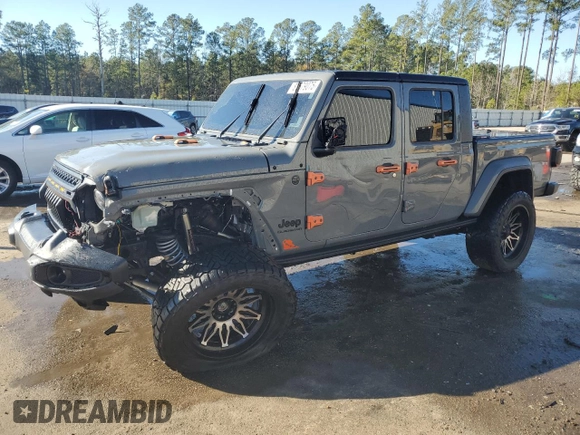 2022 Jeep Gladiator Willys with VIN 1C6HJTAG7NL117102, listed as a Copart auction lot 87679075 with 28,196 mi miles and Salvage title. Bid and sale history available at DreamBid. Image 1.