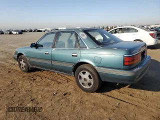 1992 Mazda 626 z VIN 1YVGD22B5N5212605, wystawiony jako Copart lot #74945704 z przebiegiem 99 659 mil mil oraz Tytuł czysty. Historia ofert i sprzedaży dostępna na DreamBid. Obrazek 2.