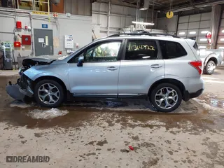 2015 Subaru Forester 2.5i Touring with VIN JF2SJAUCXFH471892, listed as a IAAI auction lot 41314722 with 94,717 mi miles. Bid and sale history available at carsss.com. Image 14.