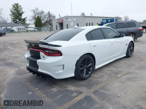 2019 Dodge Charger Scat Pack with VIN 2C3CDXGJXKH635612, listed as a IAAI auction lot 42010995 with 34,860 mi miles and . Bid and sale history available at DreamBid. Image 4.