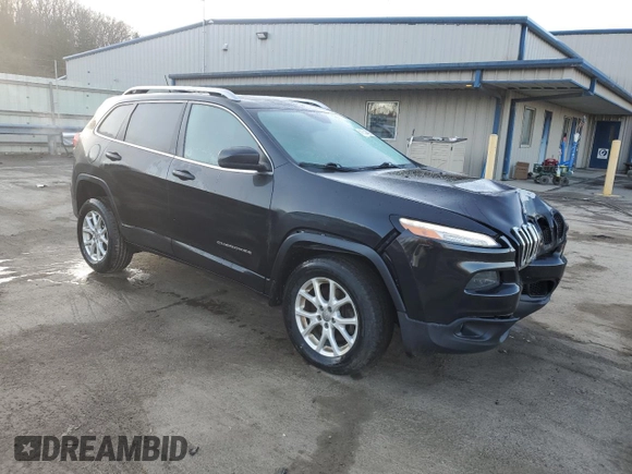 2015 Jeep Cherokee Latitude with VIN 1C4PJMCBXFW694086, listed as a Copart auction lot 49604405 with 119,743 mi miles and Salvage Title. Bid and sale history available at carsss.com. Image 4.