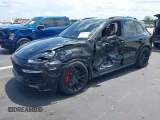 2016 Porsche Cayenne GTS z VIN WP1AD2A25GLA70430, wystawiony jako IAAI lot #42547008 z przebiegiem 108 374 mil mil oraz . Historia ofert i sprzedaży dostępna na DreamBid. Obrazek 17.