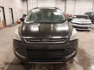 2013 Ford Escape SEL with VIN 1FMCU9H96DUC64584, listed as a IAAI auction lot 41357053 with 139,422 mi miles. Bid and sale history available at carsss.com. Image 12.