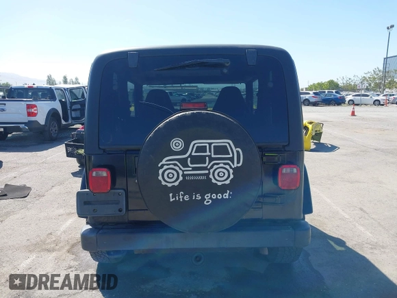 2001 Jeep Wrangler Sahara z VIN 1J4FA59S41P313113, wystawiony jako IAAI lot #42266173 z przebiegiem 125 792 mil mil oraz . Historia ofert i sprzedaży dostępna na DreamBid. Obrazek 16.