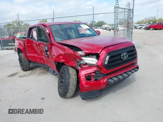 2022 Toyota Tacoma SR with VIN 3TYAX5GN1NT039848, listed as a IAAI auction lot 41210811 with 93,670 mi miles and . Bid and sale history available at DreamBid. Image 1.
