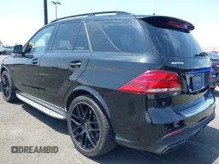2018 Mercedes-Benz GLE 63 S AMG with VIN 4JGDA7FB3JB035472, listed as a IAAI auction lot 42170871 with 23,183 mi miles and . Bid and sale history available at DreamBid. Image 3.