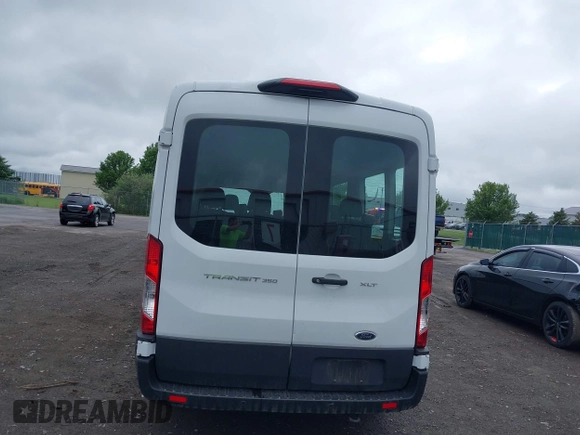 2022 Ford Transit Passenger XL with VIN 1FBAX2C86NKA79221, listed as a IAAI auction lot 42427641 with 56,245 mi miles and . Bid and sale history available at DreamBid. Image 16.