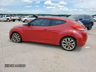2013 Hyundai Veloster w/Gray Int z VIN KMHTC6AD7DU142655, wystawiony jako Copart lot #56233005 z przebiegiem 181 297 mil mil oraz Czysty tytuł • Clean title. Historia ofert i sprzedaży dostępna na DreamBid. Obrazek 2.
