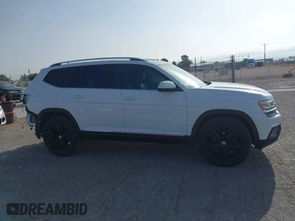 2019 Volkswagen Atlas SEL z VIN 1V2MR2CA8KC569640, wystawiony jako IAAI lot #42083995 z przebiegiem 127 104 mil mil oraz . Historia ofert i sprzedaży dostępna na DreamBid. Obrazek 13.