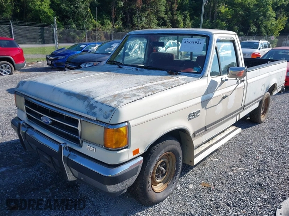 1990 Ford F-150 z VIN 1FTDF15N1LNA49113, wystawiony jako IAAI lot #42831924 z przebiegiem 48 253 mil mil oraz . Historia ofert i sprzedaży dostępna na DreamBid. Obrazek 2.