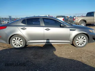 2015 Kia Optima EX z VIN 5XXGN4A7XFG402635, wystawiony jako IAAI lot #41952546 z przebiegiem 121 390 mil mil oraz . Historia ofert i sprzedaży dostępna na DreamBid. Obrazek 12.