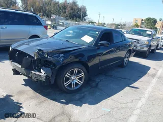 2013 Dodge Charger SE with VIN 2C3CDXBG5DH638674, listed as a IAAI auction lot 41692949 with 150,292 mi miles. Bid and sale history available at carsss.com. Image 17.