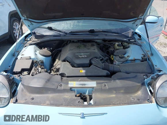 2003 Ford Thunderbird Deluxe z VIN 1FAHP60A53Y101461, wystawiony jako IAAI lot #42519933 z przebiegiem 64 820 mil mil oraz . Historia ofert i sprzedaży dostępna na DreamBid. Obrazek 10.