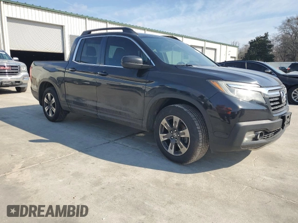 2017 Honda Ridgeline RTL with VIN 5FPYK2F57HB005101, listed as a Copart auction lot 42794275 with 189,187 mi miles and Salvage title. Bid and sale history available at DreamBid. Image 4.