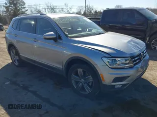 2020 Volkswagen Tiguan SE with VIN 3VV2B7AX0LM141970, listed as a IAAI auction lot 41633622 with 64,737 mi miles and . Bid and sale history available at DreamBid. Image 1.
