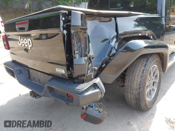 2020 Jeep Gladiator Overland with VIN 1C6HJTFG8LL176164, listed as a IAAI auction lot 42482369 with 80,009 mi miles and . Bid and sale history available at DreamBid. Image 6.