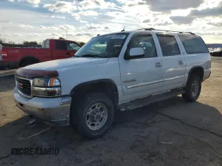2004 GMC Yukon XL SLT with VIN 3GKGK26G04G233021, listed as a Copart auction lot 42993595 with 144,425 mi miles and Salvage Title. Bid and sale history available at carsss.com. Image 1.