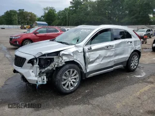 2020 Cadillac XT4 FWD Premium Luxury with VIN 1GYFZCR45LF027018, listed as a Copart auction lot 55537625 with 98,651 mi miles and Salvage title. Bid and sale history available at DreamBid. Image 1.