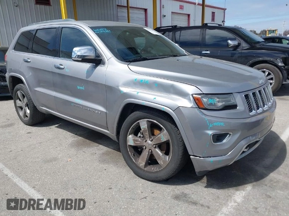2014 Jeep Grand Cherokee Overland with VIN 1C4RJECG0EC291048, listed as a IAAI auction lot 41883941 with 81,871 mi miles. Bid and sale history available at carsss.com. Image 1.