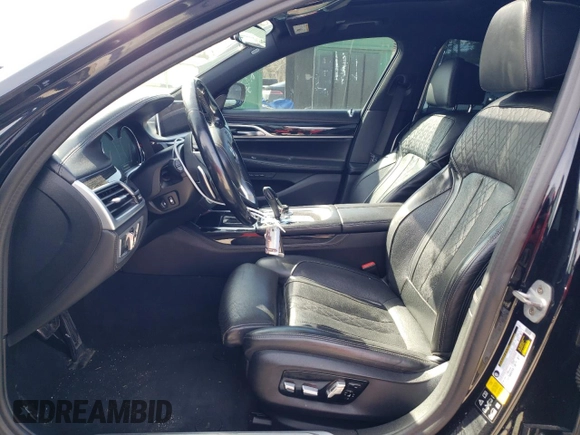 2019 BMW 7 Series 740i xDrive с VIN WBA7E4C51KGV70305, выставлен на аукционе Copart как лот 50009705 с пробегом 129 427 миль миль и Списание • Salvage title. История ставок и продаж доступна на DreamBid. Изображение 7.