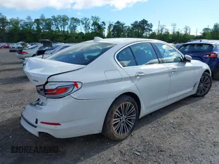 2018 BMW 5 Series 540i xDrive with VIN WBAJE7C58JWD52604, listed as a IAAI auction lot 42264240 with 107,454 mi miles and . Bid and sale history available at DreamBid. Image 4.