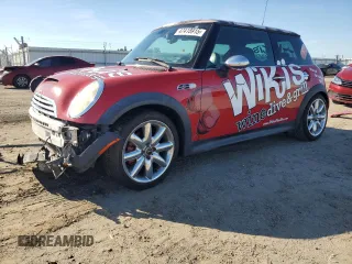 2006 MINI Hardtop S with VIN WMWRE33596TL19192, listed as a Copart auction lot 47418915 with 70,915 mi miles and Salvage Title. Bid and sale history available at DreamBid. Image 1.