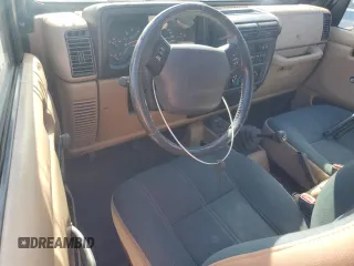 2002 Jeep Wrangler Sahara with VIN 1J4FA59S62P722411, listed as a Copart auction lot 74080364 with 0 mi miles and Non Repairable. Bid and sale history available at carsss.com. Image 8.