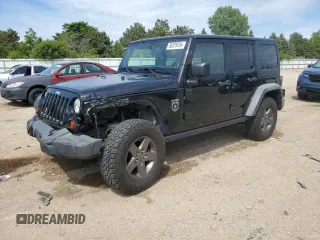 2011 Jeep Wrangler Unlimited Rubicon with VIN 1J4BA6H16BL561658, listed as a Copart auction lot 58379755 with 103,587 mi miles and Salvage title. Bid and sale history available at DreamBid. Image 1.