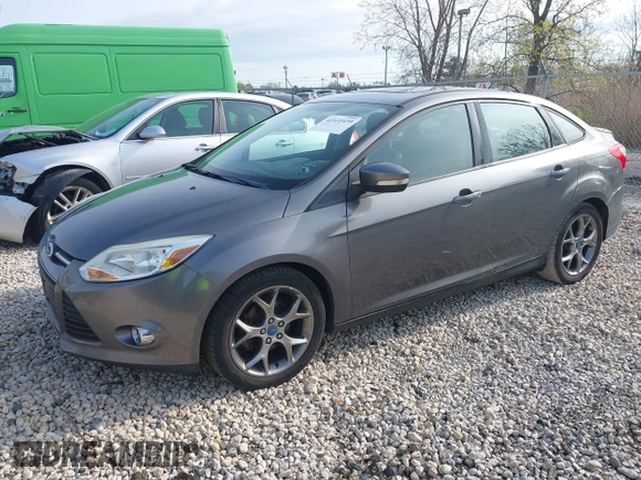 2013 Ford Focus SE with VIN 1FADP3F22DL117712, listed as a IAAI auction lot 42131439 with 124,327 mi miles. Bid and sale history available at carsss.com. Image 2.