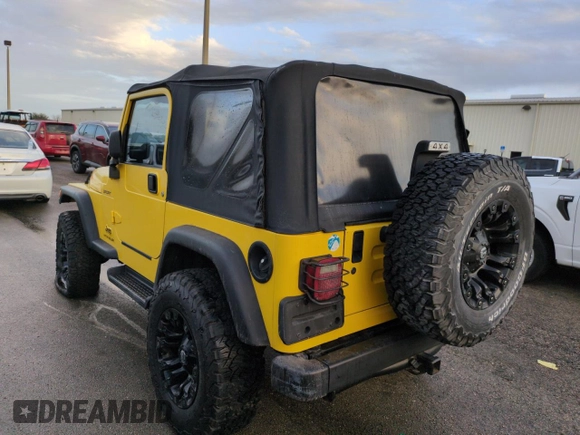 2003 Jeep Wrangler Sport with VIN 1J4FA49S93P373532, listed as a Copart auction lot 74595774 with 105,018 mi miles and Non Repairable. Bid and sale history available at carsss.com. Image 2.