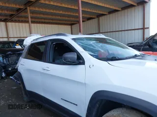 2021 Jeep Cherokee Trailhawk with VIN 1C4PJMBX4MD153086, listed as a IAAI auction lot 41132030 with 56,367 mi miles and . Bid and sale history available at DreamBid. Image 13.