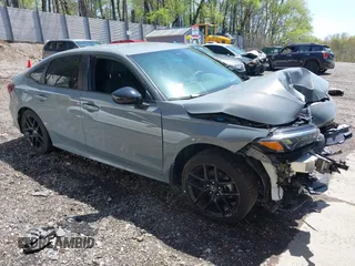 2025 Honda Civic Sport with VIN 2HGFE2F59SH532793, listed as a IAAI auction lot 42159971 with 9,404 mi miles and . Bid and sale history available at DreamBid. Image 1.