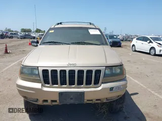 1999 Jeep Grand Cherokee Limited with VIN 1J4GW68N2XC654713, listed as a IAAI auction lot 42115829 with 195,988 mi miles. Bid and sale history available at carsss.com. Image 6.