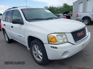 2005 GMC Envoy SLE z VIN 1GKDT13S652279384, wystawiony jako IAAI lot #42208597 z przebiegiem 147 036 mil mil oraz . Historia ofert i sprzedaży dostępna na DreamBid. Obrazek 1.
