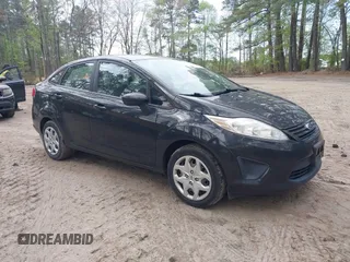 2013 Ford Fiesta S z VIN 3FADP4AJ8DM192451, wystawiony jako IAAI lot #41986049 z przebiegiem 131 946 mil mil oraz . Historia ofert i sprzedaży dostępna na DreamBid. Obrazek 1.