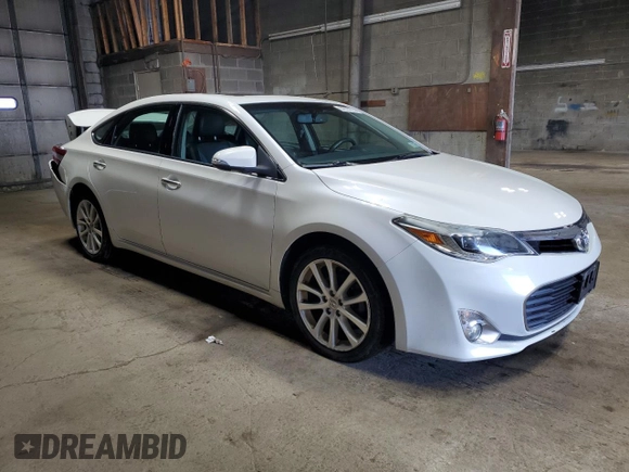 2015 Toyota Avalon Limited with VIN 4T1BK1EB6FU186515, listed as a Copart auction lot 54027865 with 104,000 mi miles and Salvage Title. Bid and sale history available at DreamBid. Image 4.